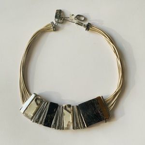 Necklace by Anne Marie Chagnon. Pewter, leather, resin. Like new. Length: 18”